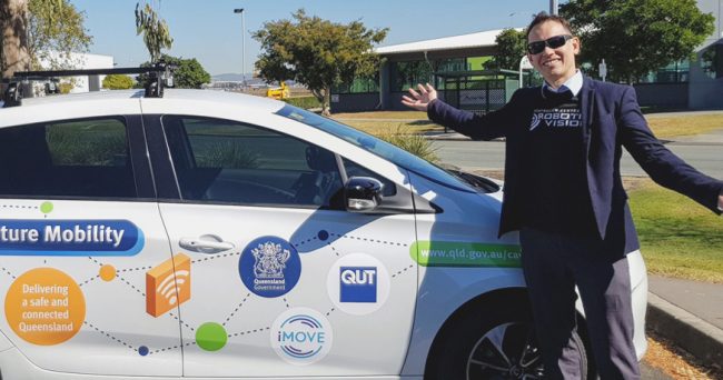 Michael Milford with CHAD vehicle