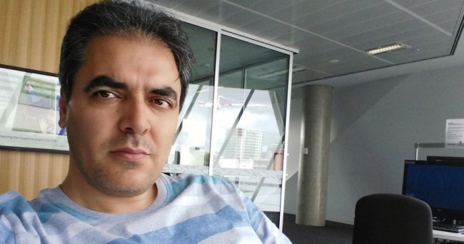 Ali Soltani in the office