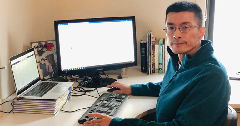 Colin Lew working from home