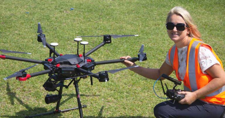 Jackie Dujmovic of Hover UAV, and a drone