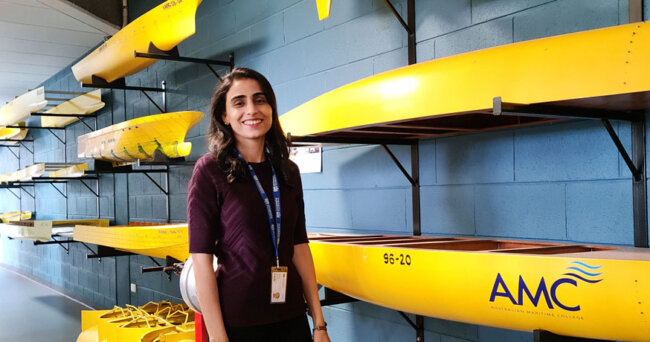 Mehrangiz Shahbakhsh with ship models at University of Tasmania