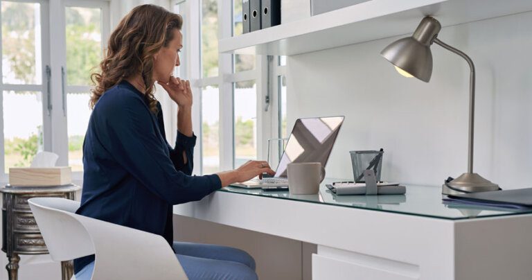 woman at desk working from home