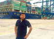 Hadi Ghaderi at shipping dock