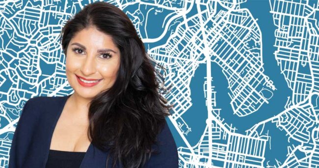 Ishra Baksh with Brisbane map backdrop