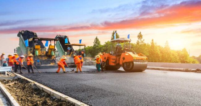 road construction crew and equipment