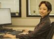 Yijie Su at her desk